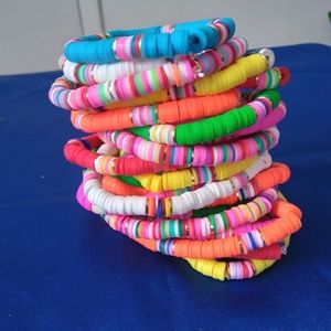 4 Stacks beaded Bracelets & one Charm Necklace